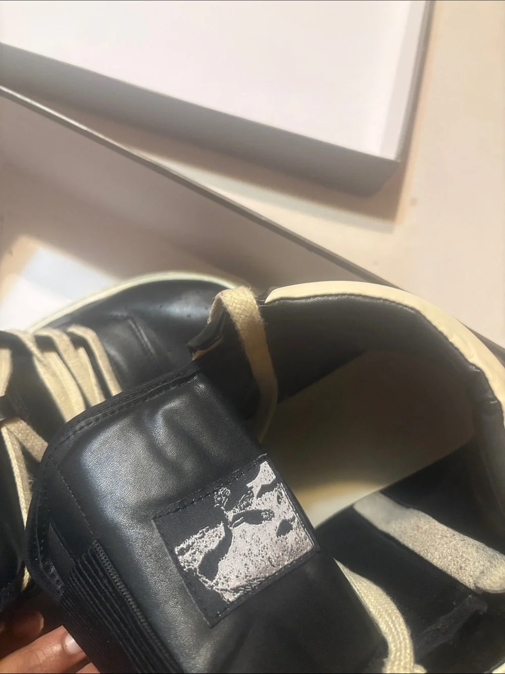Rick Owens Black and Cream High-Top Sneaker